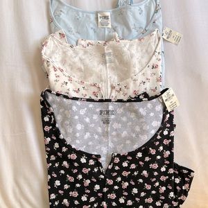 NWT PINK COLLECTION BODY SUIT LONG SLEEVE FLORAL PRINT